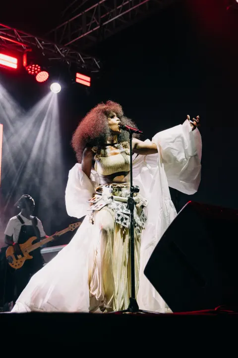 Zoë Modiga performing on stage.