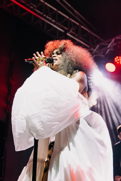 Zoë Modiga performing on stage.
